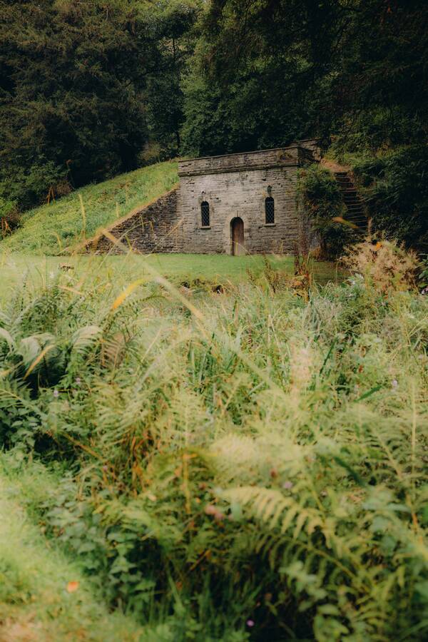 The Georgian cold bath, a historic plunge pool in the woods at The Salwey Lodge near Ludlow