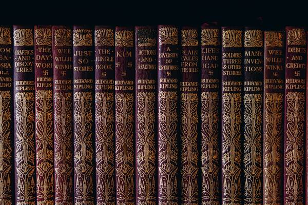 Gilt-tooled Rudyard Kipling volumes in the library at The Salwey Lodge near Ludlow