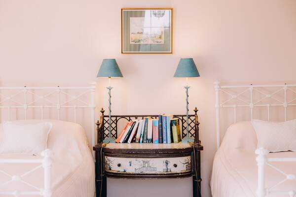The pink twin bedroom at The Salwey Lodge near Ludlow