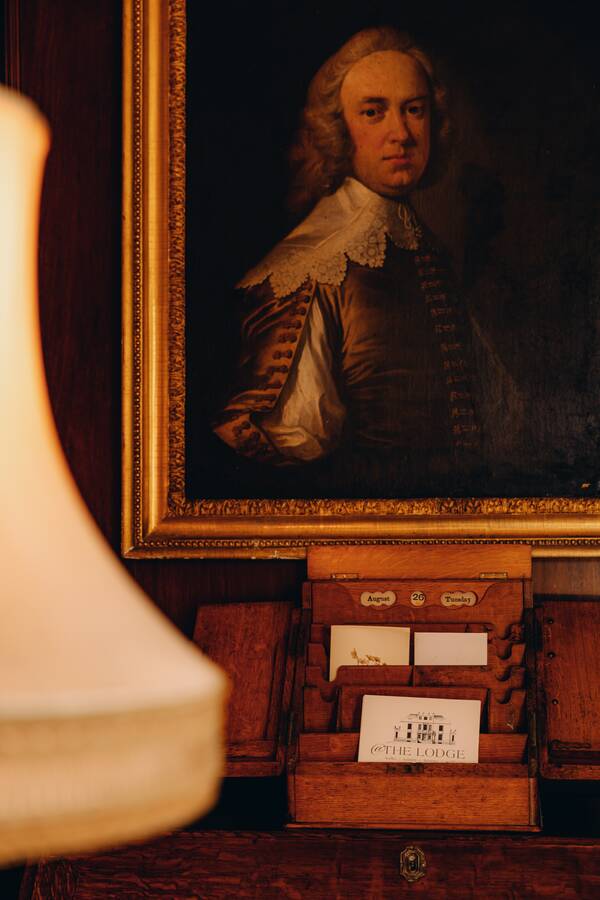 An 18th-century style portrait in a gilt frame at The Salwey Lodge near Ludlow
