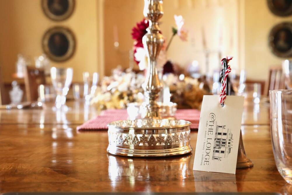 The dining table laid for a dinner party at The Salwey Lodge, available for private hire